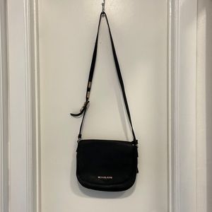 Black leather Michael Kors saddle bag